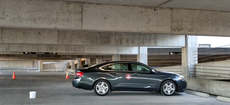 Marked vehicle in a parking garage